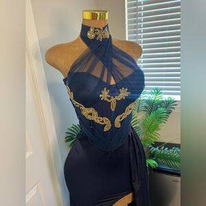 Navy blue bridesmaids or prom dress with corset and gold embellishments.